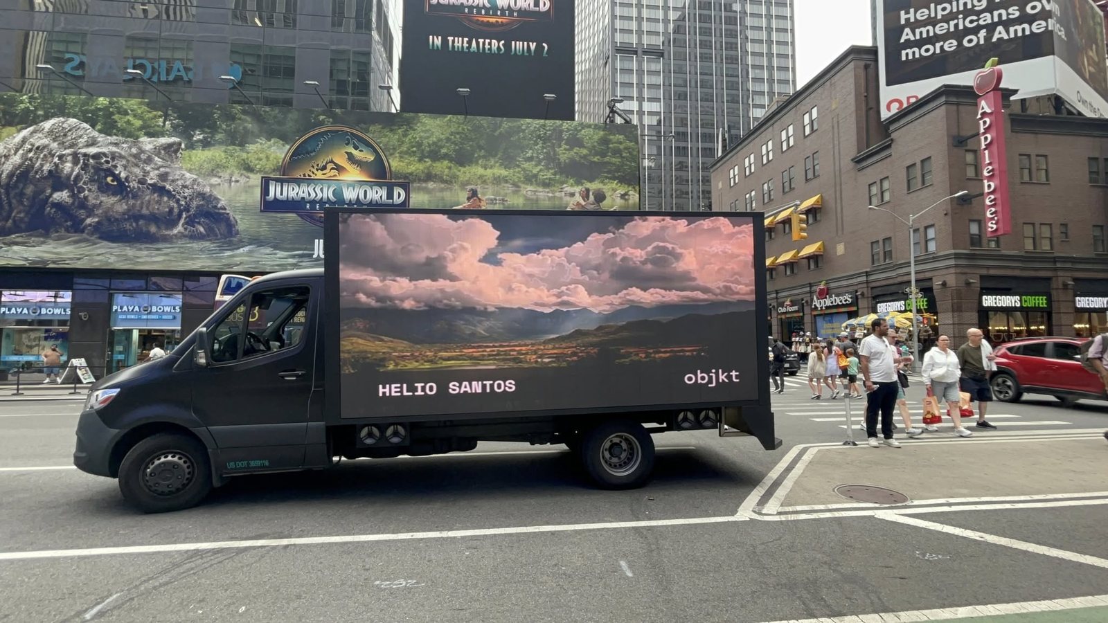 A landscape by Helio Santos on a mobile LED screen truck in Midtown Manhattan, signed Helio Santos and objkt